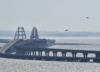 Consilierul lui Putin: Navele Marinei Ruse vor escorta navele comerciale rusești