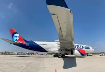 Un român arestat la Belgrad pentru escrocherie cu carduri pe zborurile Air Serbia